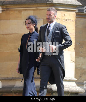 Célébrité britannique David Beckham et son épouse Victoria arrivent pour le mariage du prince Harry et Meghan Markle à la Chapelle St George à Windsor, London, 19 mai 2018. Photo par Hugo Philpott/UPI Banque D'Images