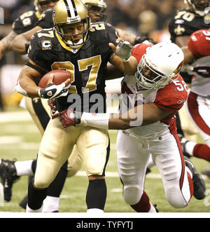 New Orleans Saints quarter back Drew Brees hugs running back Reggie Bush as  the Saints defeat the Indianapolis Colts in Super Bowl XLIV at Sun Life  Stadium in Miami on February 7