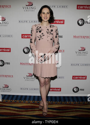 Michelle Dockery arrive sur le tapis rouge à la 'Downton Abbey' Saison 4 cast photo au Millenium Hotel à New York City le 10 décembre 2013. UPI/John Angelillo Banque D'Images