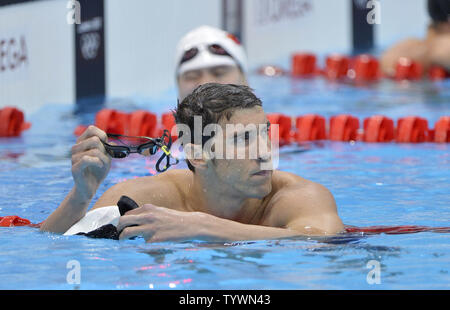 Michael Phelps, de l'United States revient sur son temps après la baignade au cours de la chauffe de la Men's 400m quatre nages individuel au Jeux Olympiques d'été de 2012 à Londres le 28 juillet 2012 à Stratford, Londres. UPI/Brian Kersey Banque D'Images