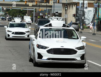 Detroit, MI, USA. 25 Juin, 2019. Une IA, Argo Ford véhicule test sur Michigan Avenue. Le 25 juin 2019 à Detroit, Michigan. L'IA, l'Argo à base de Pittsburgh de démarrage du véhicule autonome dans laquelle Ford a investi 1 milliards de dollars en 2017, a élargi ses essais au centre-ville de Detroit avec une nouvelle troisième génération de conduite auto-voiture. Crédit : Jeff Kowalsky/ZUMA/Alamy Fil Live News Banque D'Images