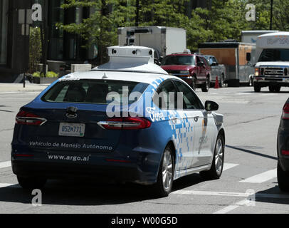 Detroit, MI, USA. 25 Juin, 2019. Une IA, Argo Ford véhicule test sur Michigan Avenue. Le 25 juin 2019 à Detroit, Michigan. L'IA, l'Argo à base de Pittsburgh de démarrage du véhicule autonome dans laquelle Ford a investi 1 milliards de dollars en 2017, a élargi ses essais au centre-ville de Detroit avec une nouvelle troisième génération de conduite auto-voiture. Crédit : Jeff Kowalsky/ZUMA/Alamy Fil Live News Banque D'Images