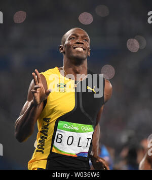 La Jamaïque Usain Bolt remporte le 100m dans le stade olympique au Jeux Olympiques de Rio 2016 à Rio de Janeiro, Brésil, le 14 août 2016. Bolt a remporté l'or avec un temps de 9,86 secondes. Photo par Terry Schmitt/UPI Banque D'Images