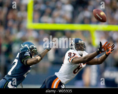 Chicago Bears wide receiver Muhsin Muhammad, (87) celebrates his first  quarter touchdown with Bernard Berrian, (80) and Cedric Benson, (32) during  their NFL football game at Soldier Field in Chicago, Ill., Sunday