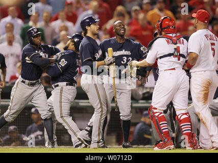 Milwaukee Brewers pitcher LaTroy Hawkins falls as he delivers against the  Minnesota Twins in a baseball game Friday, July 1, 2011 in Minneapolis. (AP  Photo/Andy King Stock Photo - Alamy