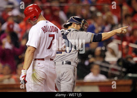 Milwaukee Brewers pitcher LaTroy Hawkins falls as he delivers against the  Minnesota Twins in a baseball game Friday, July 1, 2011 in Minneapolis. (AP  Photo/Andy King Stock Photo - Alamy