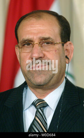 Le Premier ministre irakien Nouri al-Maliki assiste à une conférence de presse conjointe avec le président George Bush à la Maison Blanche, à Washington le 25 juillet 2006. (UPI Photo/Kevin Dietsch) Banque D'Images