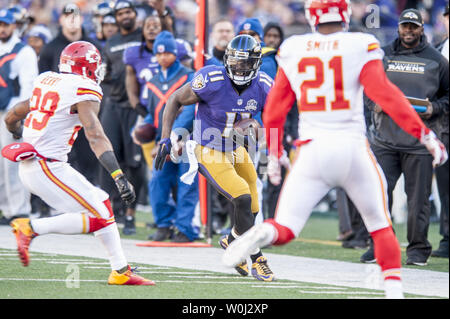 Baltimore Ravens' wide receiver Kamar Aiken s'exécute la balle au cours du deuxième trimestre contre les Kansas City Chiefs' chez M&M Bank Stadium le 20 décembre 2015 à Baltimore, Maryland. Photo par Pete Marovich/UPI Banque D'Images