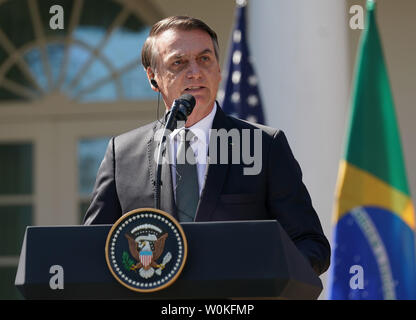 Le Président brésilien Bolsonaro Jaďr, prend la parole lors d'une conférence de presse conjointe avec le Président Donald Trump dans la roseraie de la Maison Blanche à Washington, DC Le 19 mars 2019. Photo de Chris Kleponis/UPI Banque D'Images