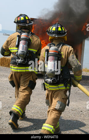 Les pompiers et le feu à la Lansing Harbour Festival Banque D'Images