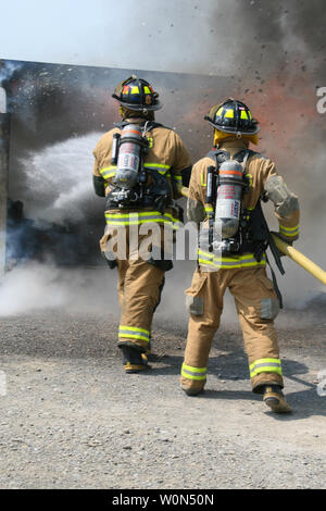 Les pompiers et le feu à la Lansing Harbour Festival Banque D'Images