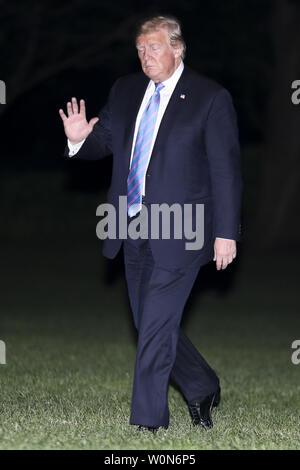 Le président Donald Trump promenades sur la pelouse Sud qu'il sera de retour à la Maison Blanche après un voyage en Louisiane le 14 mai 2019 à Washington, DC. Photo par Oliver Contreras/UPI Banque D'Images