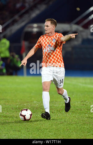 Johor Bahru, Malaisie. 30 Juin, 2019. Alistair Edward Martin JDT du reste du monde s'exécute avec le ballon lors de l'amical match de bienfaisance All-Stars JDT JDT JDT et ATM entre le reste du monde à Johor Bahru, Malaisie, le 30 juin 2019. Credit : Chong Chung Voon/Xinhua/Alamy Live News Banque D'Images