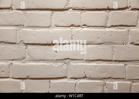 L'arrière-plan est fait en or jaune, blanc ou gris de briques avec un relief ondulé, fissures, trous et les fossés. Les matériaux de construction pour la décoration et la décoration en th Banque D'Images