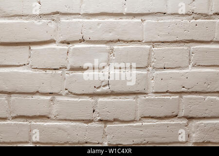 L'arrière-plan est fait en or jaune, blanc ou gris de briques avec un relief ondulé, fissures, trous et les fossés. Les matériaux de construction pour la décoration et la décoration en th Banque D'Images