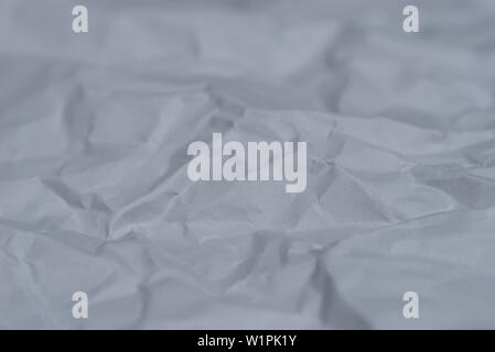 Froissé gris papier couleur texture background focus sélectif closeup Banque D'Images