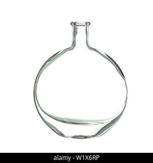 Ancienne bouteille en verre rond et plat isolé sur blanc. Banque D'Images