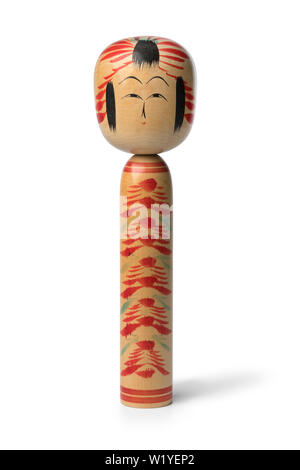 Japonais traditionnel en bois ancienne poupée kokeshi isolé sur fond blanc Banque D'Images