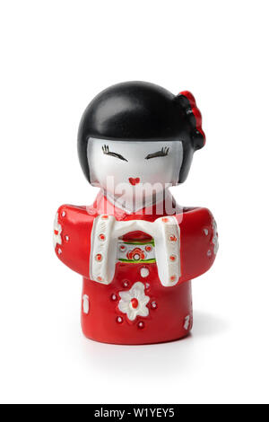 Poupée kokeshi japonaise moderne traditionnel isolé sur fond blanc Banque D'Images