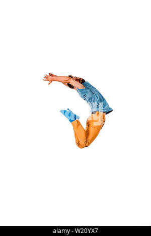 Disco Dancer montrant certains mouvements isolés contre fond blanc Banque D'Images