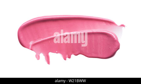 Traits rose doucement et la texture de la peinture acrylique ou brillant à lèvres isolé sur fond blanc Banque D'Images