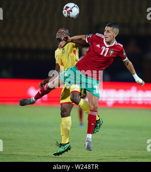 En France, le 5 juillet 2019 : Faycal Fajr du Maroc et Anane Tidjani du Bénin au cours de la coupe d'Afrique des Nations 2019 match entre le Maroc et le Bénin au stade Al Salam du Caire, Égypte. Ulrik Pedersen/CSM. Banque D'Images