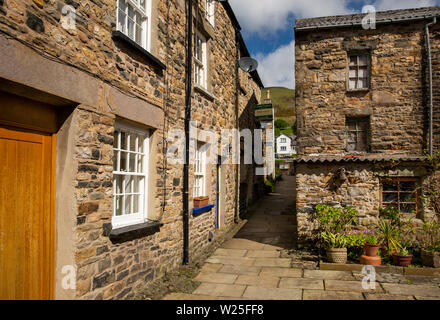 UK, Cumbria, Sedbergh, la folie, maisons d'allée entre la rue principale et de Ruelle Banque D'Images