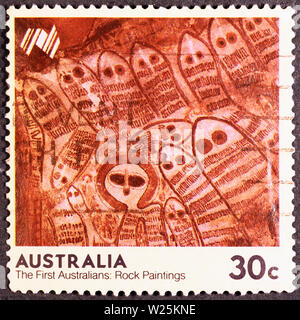 Les peintures de roche sur des timbres australiens Banque D'Images