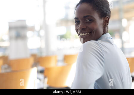 African-american woman sitting in conference room Banque D'Images