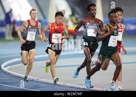 Naples, Italie. 09 juillet 2019. Wang Hao (2L) de la concurrence de la Chine au cours de la Finale Hommes 10 000 m lors de la 30e Universiade d'été à Naples, Italie, le 9 juillet 2019. Credit : Zheng Huansong/Xinhua/Alamy Live News Banque D'Images