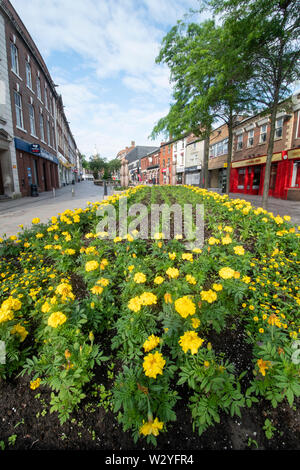 Rue Buttermarket, une rue piétonne dans la ville de Warrington dans le Cheshire. L'ancienne ville industrielle de Warrington, précédemment dans le Lancashire, j Banque D'Images