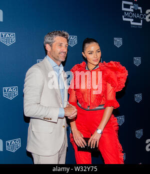 TAG Heuer célèbre 50 Yerars Modèle emblématique de Monaco avec Patrick Dempsey et Olivia Culpo Banque D'Images