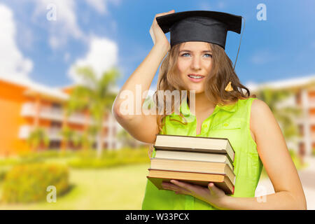 Happy student in graduation cap Banque D'Images