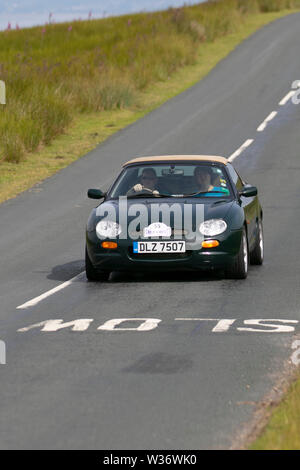 MG MGF 1.8I Abingdon à Scorton, Lancashire, Royaume-Uni.. Météo britannique le 13 juillet, 2019.conditions ensoleillées comme le rallye du club de voiture Lancashire Coast to Coast traverse le creux de Bowland. 74 vintage, classic oldtimers, percevable, patrimoine, véhicules historiques de Morecambe gauche en direction d'un cross county voyage à travers les paysages du Lancashire à Whitby. A 170 milles en plus de paysage vallonné dans le cadre de l'événement annuel de club de voiture. Credit : MediaWorldImages/Alamy Live News Banque D'Images