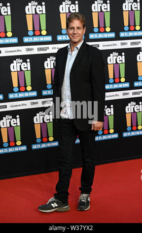 Cologne, Allemagne. Le 13 juillet, 2019. L'acteur Thomas Heinze vient à la première du film 'Die Drei ! ! !'. Credit : Henning Kaiser/dpa/Alamy Live News Banque D'Images