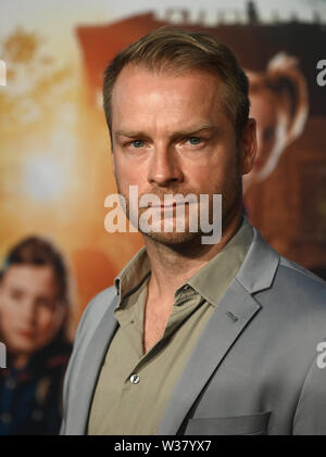 Cologne, Allemagne. Le 13 juillet, 2019. L'acteur Hinnerk Schönemann vient à la première du film 'Die Drei ! ! !'. Credit : Henning Kaiser/dpa/Alamy Live News Banque D'Images