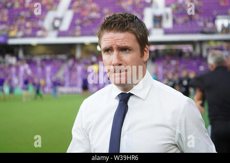 Orlando, USA. Le 13 juillet, 2019. La Ville d'Orlando l'entraîneur-chef James O'Connor entre dans Exploria stadium à Orlando en Floride le 13 juillet 2019. Crédit photo : Marty Jean-Louis Marty Crédit : Jean-Louis/Alamy Live News Banque D'Images