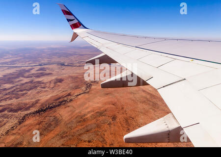 British Airways Boeing 737-800 en survolant le désert du Kalahari, la Namibie/Botswana Banque D'Images
