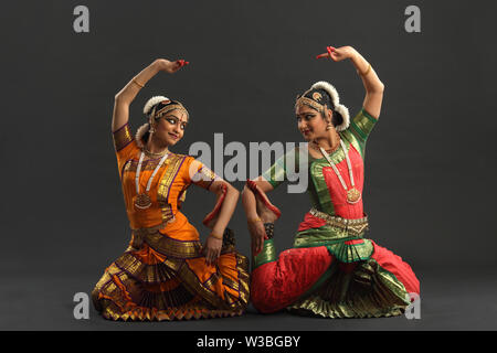 Two women performing Bharatanatyam dance Stock Photo