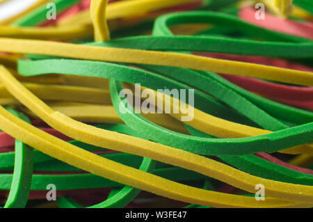 Vert et jaune macrophotographie des bandes en caoutchouc élastique Banque D'Images