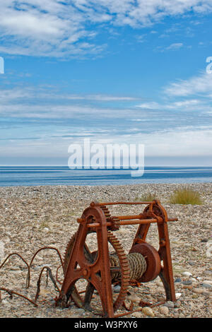 Côte de Moray de FINDHORN EN ÉCOSSE EN ÉTÉ Vieux Treuil à câble rouillé SUR LA PLAGE Banque D'Images