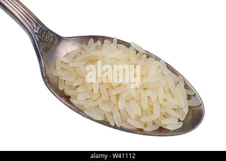 Dans l'ancienne coupe d'or il y a un petit tas d'aliments cuits à la vapeur - riz long grain. Isolé sur blanc macro studio Banque D'Images