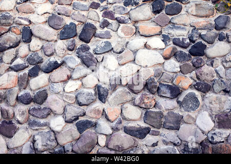 Cailloux colorés naturels de base sur la plage en été pour wall design et concept de fond naturel en été. Banque D'Images