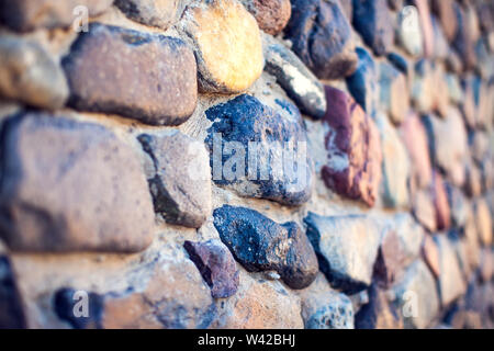 Cailloux colorés naturels de base sur la plage en été pour wall design et concept de fond naturel en été. Banque D'Images