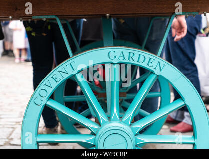 20 juillet 2019 - Londres, Royaume-Uni. Covent Garden signe sur l'ancien marché en bois panier roue. Banque D'Images