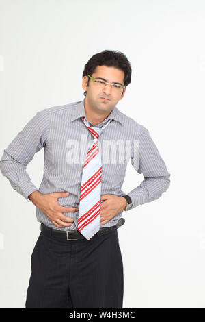 Businessman souffrant de douleur abdominale Banque D'Images