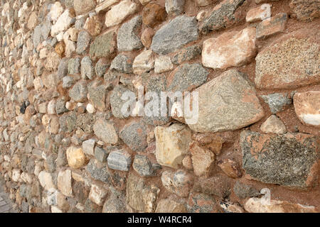 Vue de détail d'un mur de roche texturé Banque D'Images