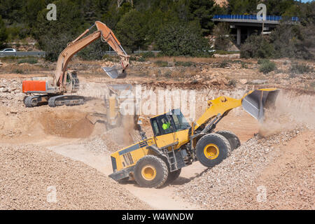 Machines pelle travaillant dans la construction site Banque D'Images