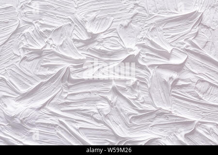 Abstract grunge fond blanc peint. Titinium fond a été peint avec de l'huile sur toile de couleur blanche à la main. Banque D'Images