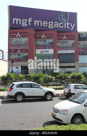 Shopping mall at the roadside, Gurgaon, Haryana, India Stock Photo